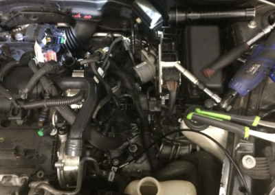this image shows spark plugs and ignition coil in Pasadena, CA